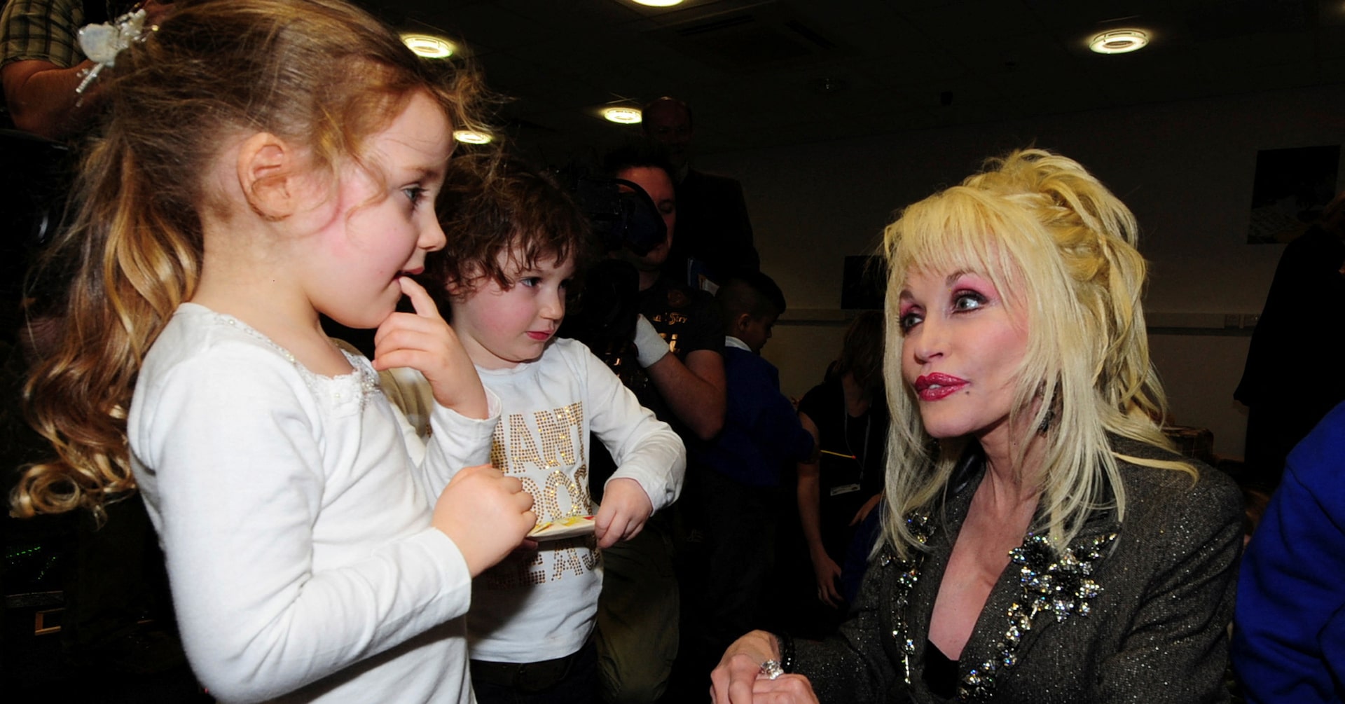 Dolly Parton speaking to children at an Imagination Library launch, from Reuters.